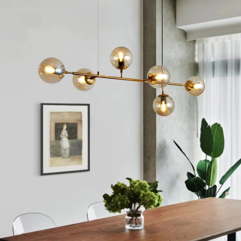 The Allure of Illuminating Spaces: The Subtle Luxury of Orb Chandelier – Dekoorlight