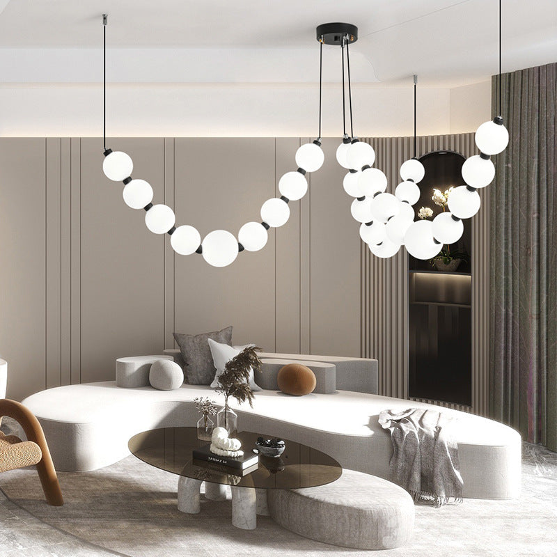 Illuminate Your Space with Elegance: Explore the Pearl Necklace Chandelier Series
