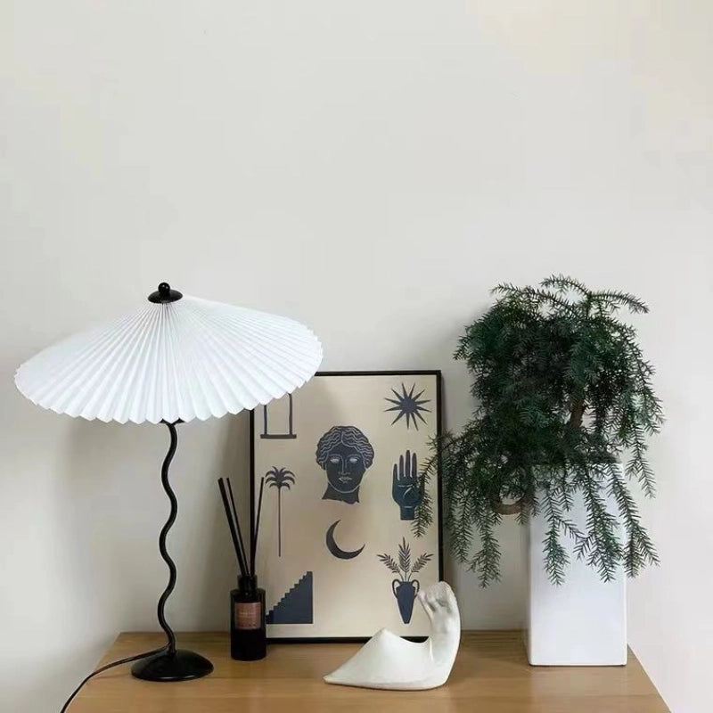 Discover the Squiggle Table Lamp: Where Art Meets Functionality