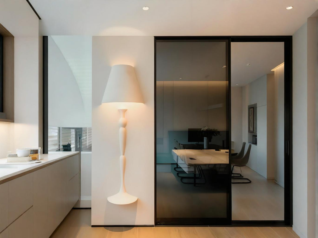 A Plaster wall lamp with white is near the kitchen