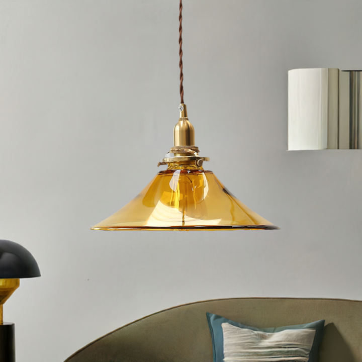 Amber Glass Pendant Light is near the sofa