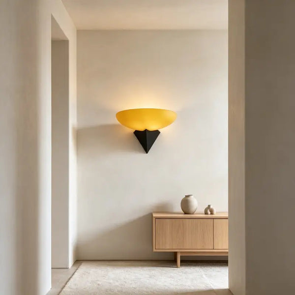 Bauhaus Retro Wall Lamp with amber frosted glass shade, mounted on plaster wall for minimalist entryway interior lighting