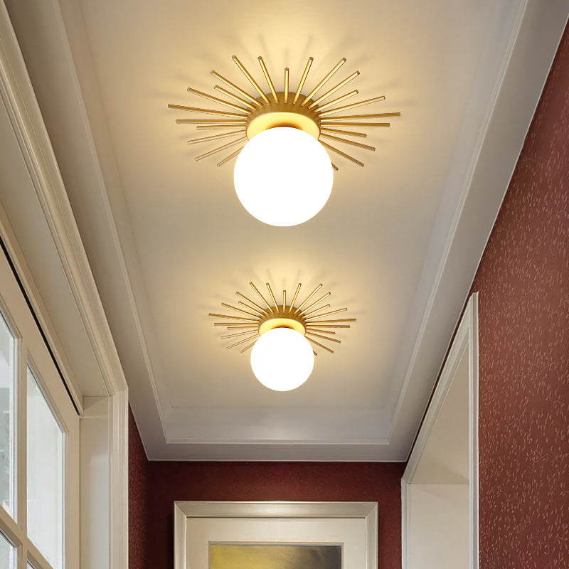 Brass Sunburst Ceiling Lamp in the corridor