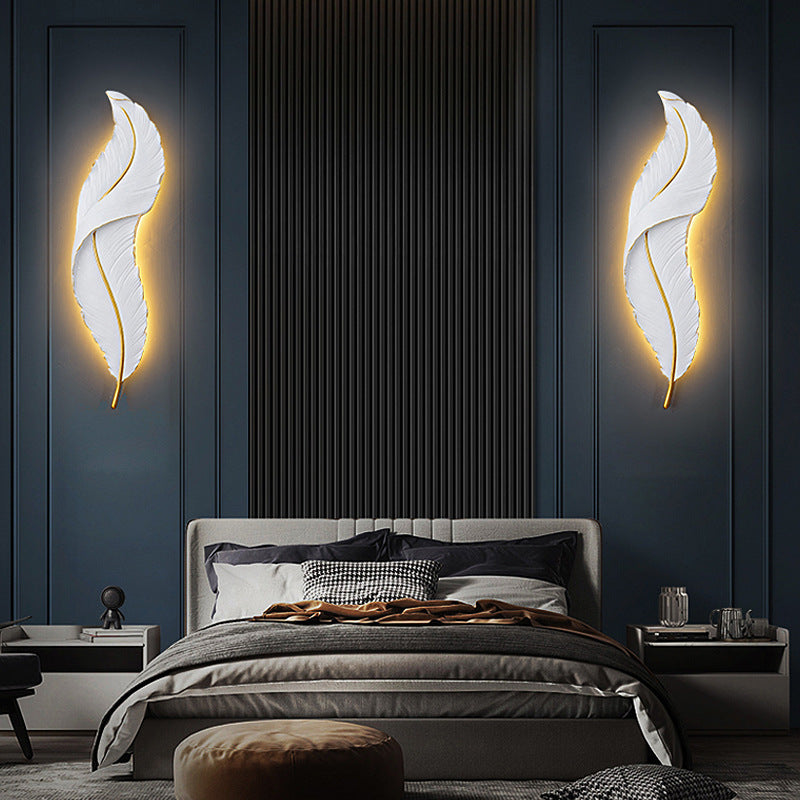 Feather wall lamp is in the bedroom