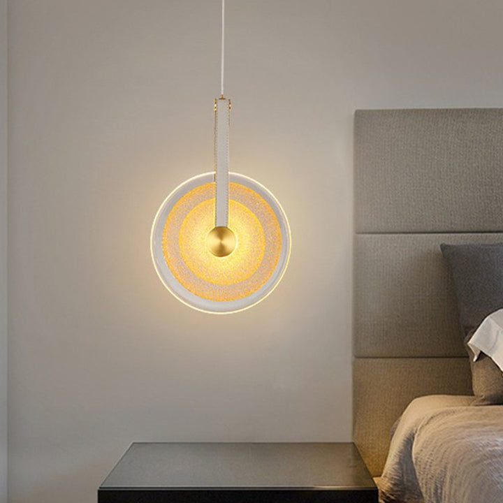 Frosted Gold Disc Pendant Light in bedside