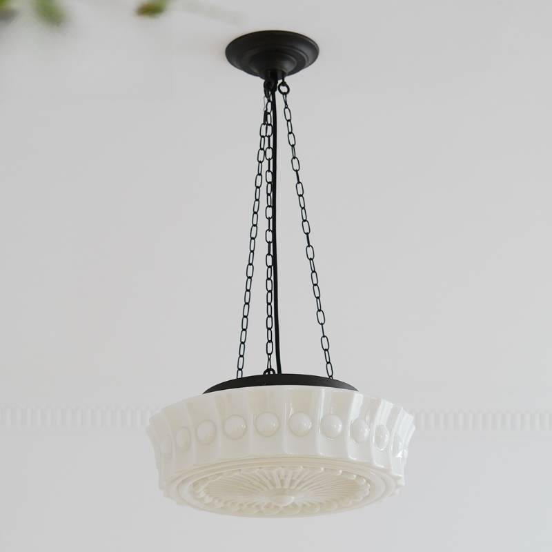 The Zen Milk Glass Pendant Light is also beautiful when the lights are off