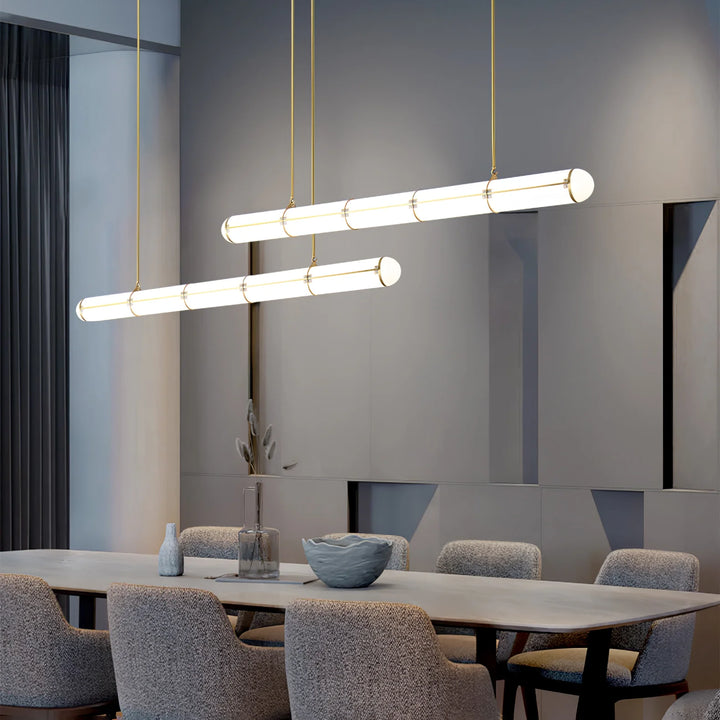 Infinite Modern Chandelier above a stylish dining table in a contemporary interior design setting.