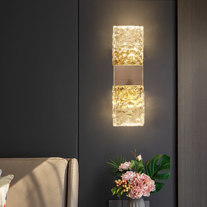 Luxury Crystal Wall Sconce displaying elegant design with golden accents and a stylish wall installation.