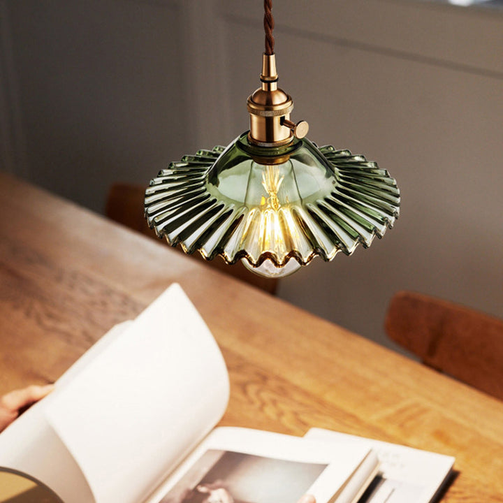 Mini Pleated Glass pendant light above the table