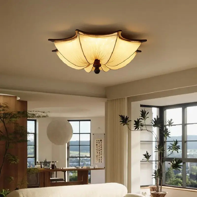 Modern Luvina Ceiling Lamp featuring a pleated fabric shade and walnut-finish frame in a contemporary living space.