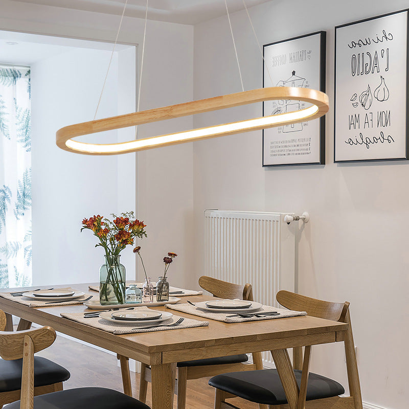 Nordic Simple Oval Pendant Lamp above the dining table
