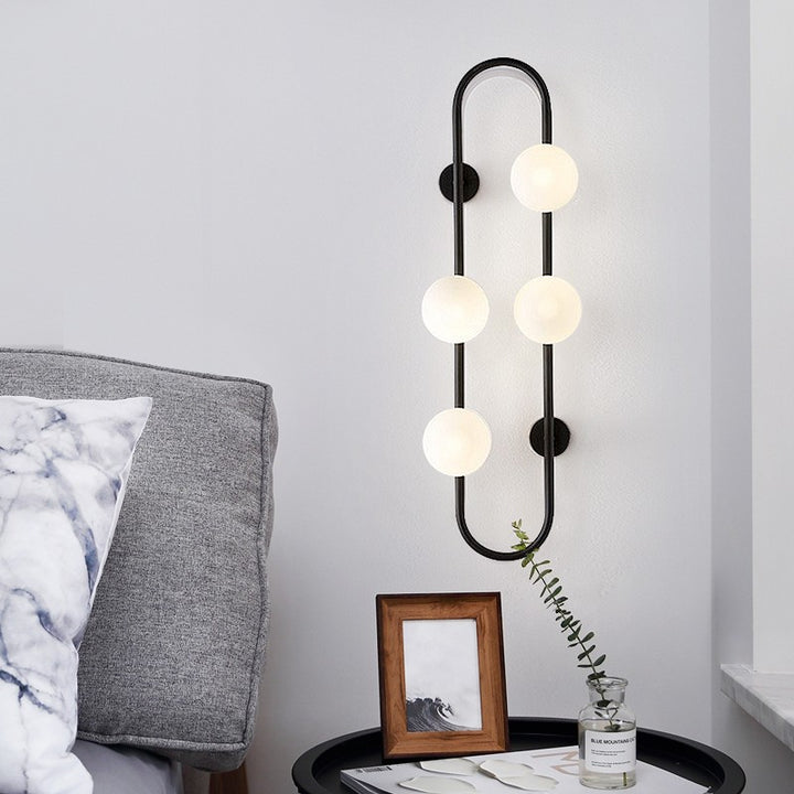 Ovale glazen bol wandlamp