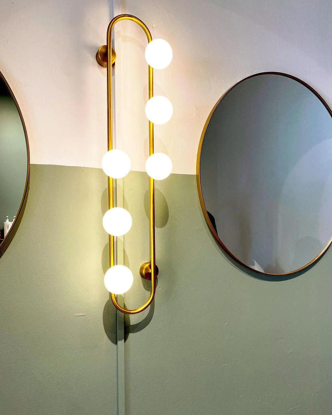 Oval Glass Ball Wall Lamp in bathroom