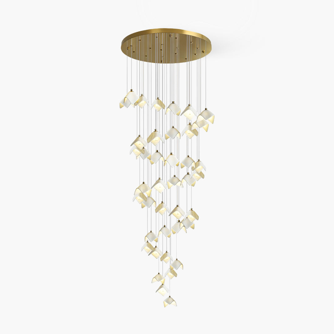 Modern staircase chandelier in a tall foyer
