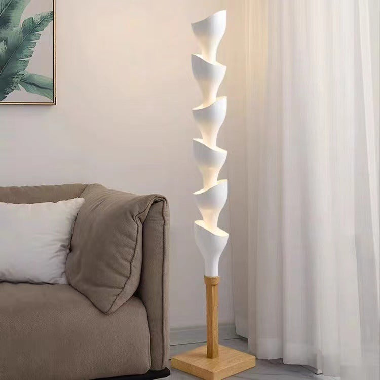 Pod Flower Floor Lamp brights beside the sofa