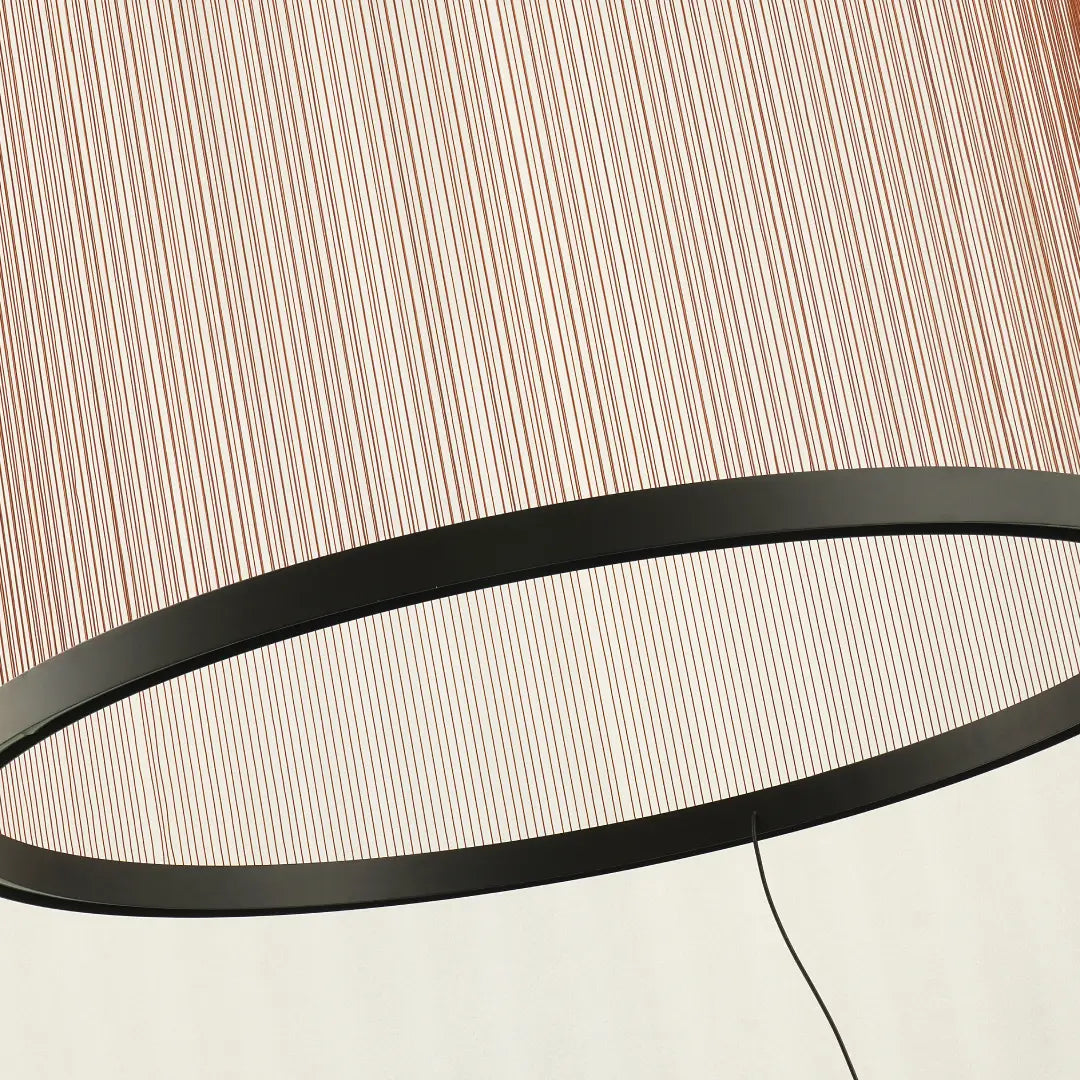 Spanish Cylinder Chandelier, close‑up detail of black metal circular frame and evenly spaced vertical string shade, showing minimalist lamp internal construction