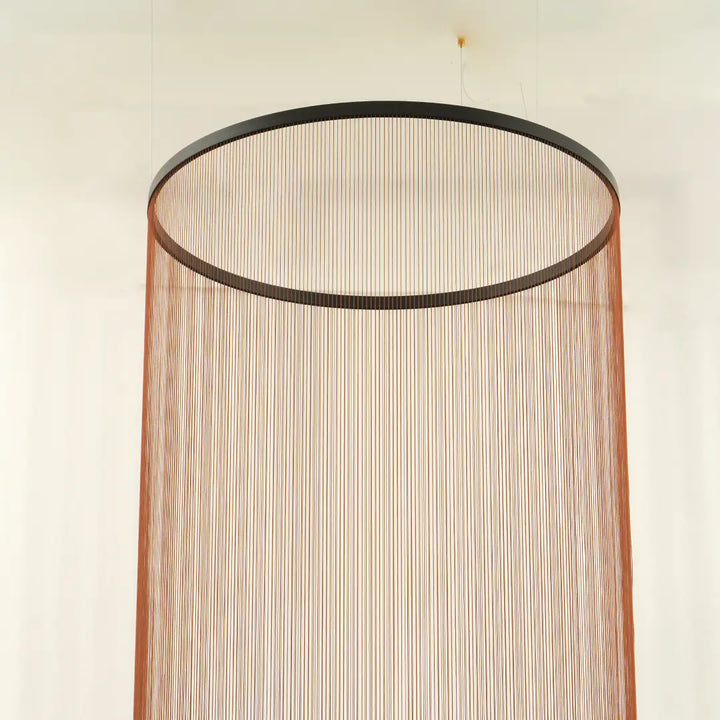 Spanish Cylinder Chandelier, large cylinder hanging chandelier made of fine vertical string curtain and matte black metal frame, ceiling‑mounted product shot