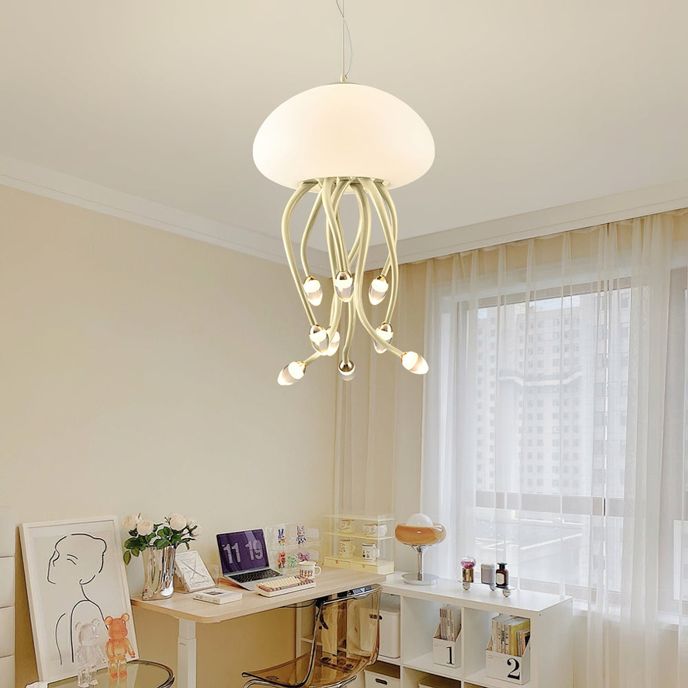 Cream jellyfish chandelier with soft dome shade and flowing tentacle lights in a bright minimalist workspace