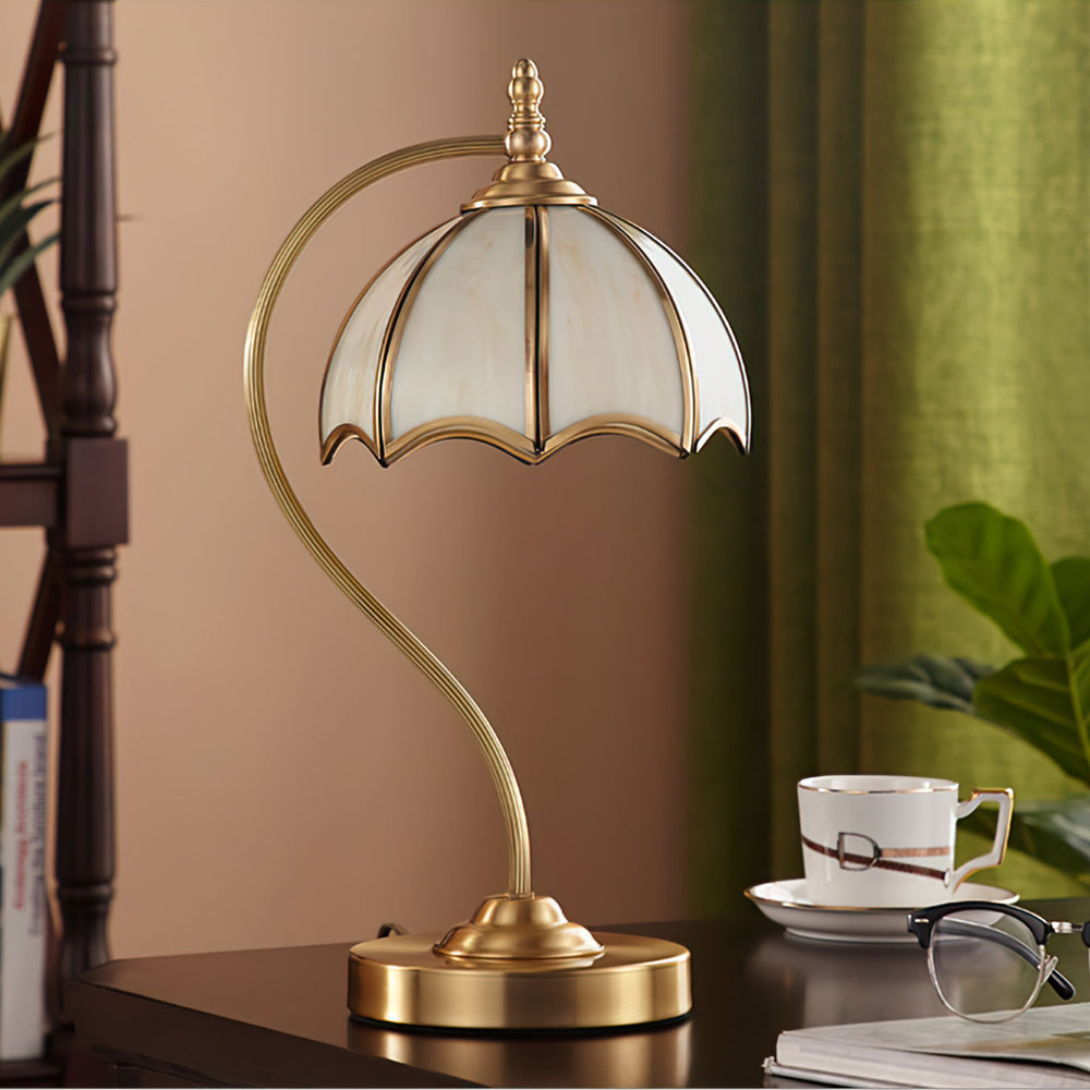 Decorative umbrella table lamp with scalloped glass shade and brass frame